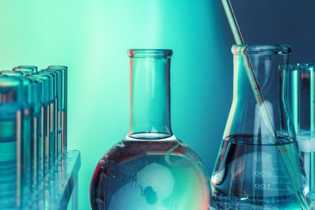 Laboratory chemistry glassware  on green toned background